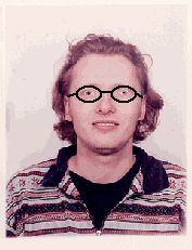 4. A picture of me wearing round glasses with a coloured rim